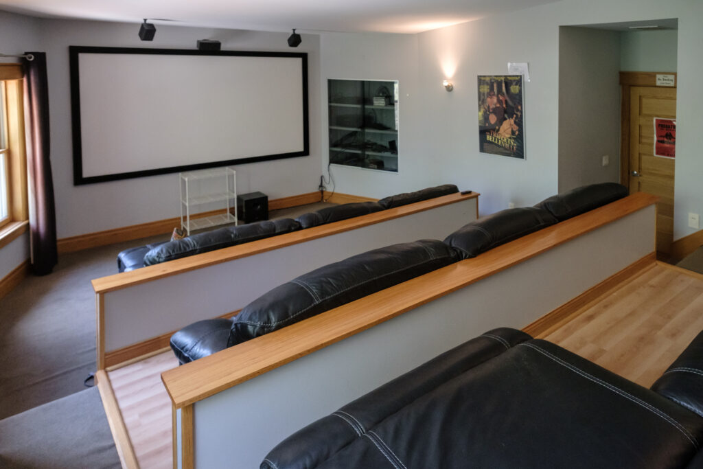 3-tier theatre room in the Main Lodge at Top of the World Ranch addiction treatment center in Milan IL, perfect for relaxing movie nights on weekends as part of holistic residential rehab recovery.